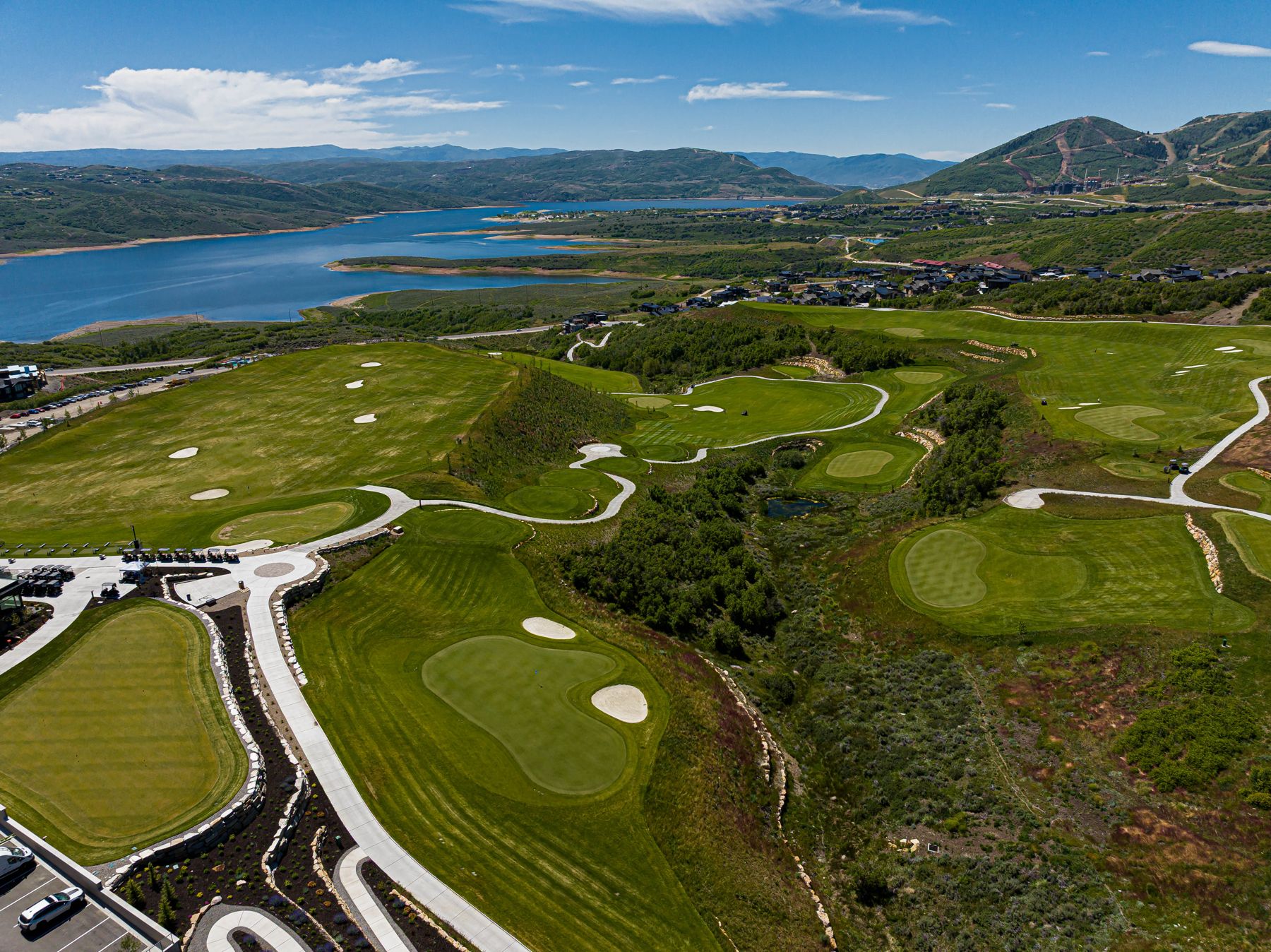Aerial view of SkyRidge Golf Course with Jordanelle Reservoir and Wasatch Mountains